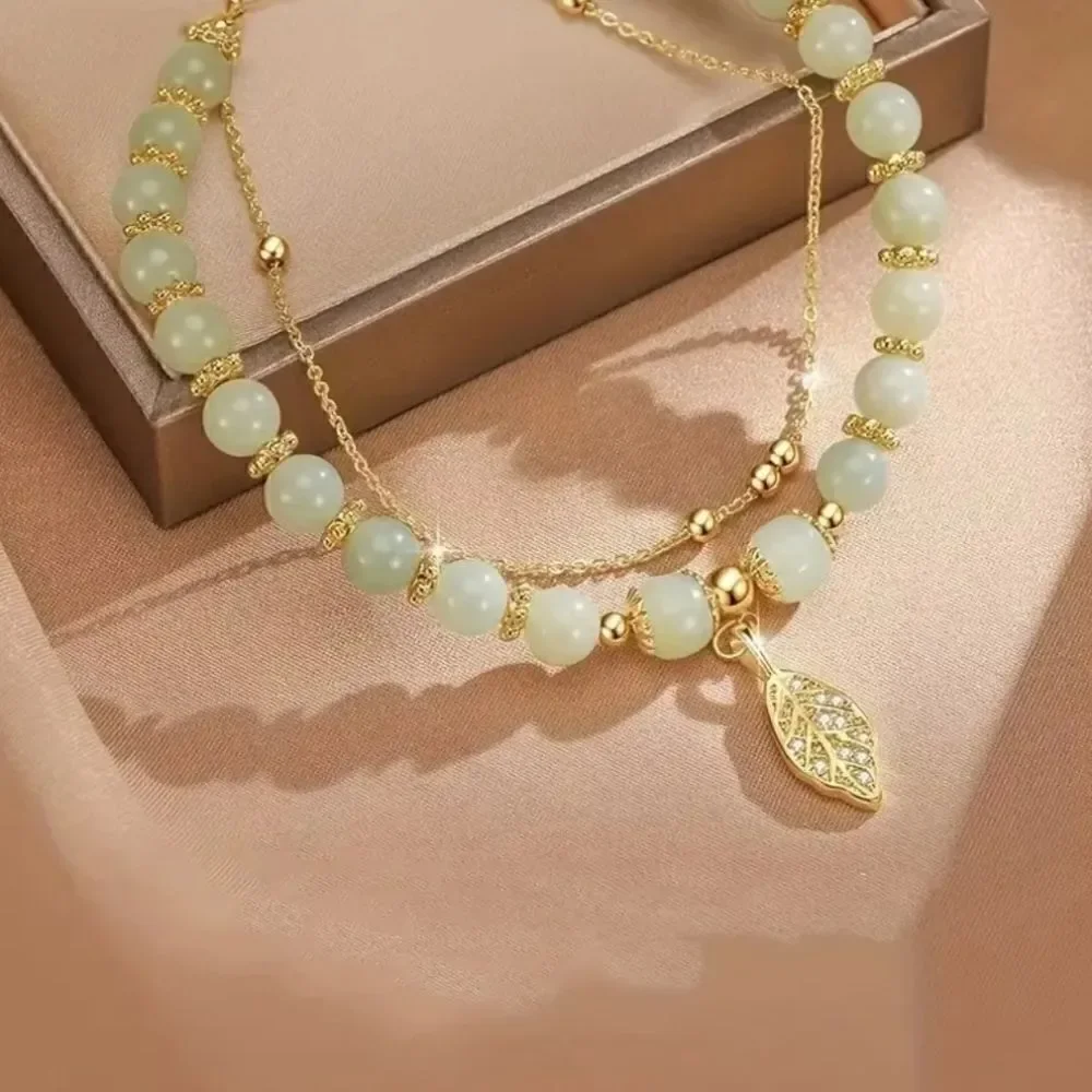 Double-Layer Green Jade Beaded Bracelet with Sparkling Golden Leaf Charm
